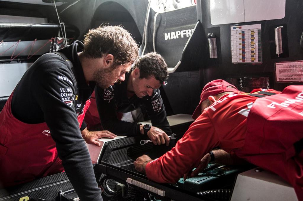 October 13, 2014. –eti, anthony and xabi are getting a full look at the engine photo copyright Volvo Ocean Race - Team Campos - Francisco Vignale http://www.volvooceanrace.com/ taken at  and featuring the  class