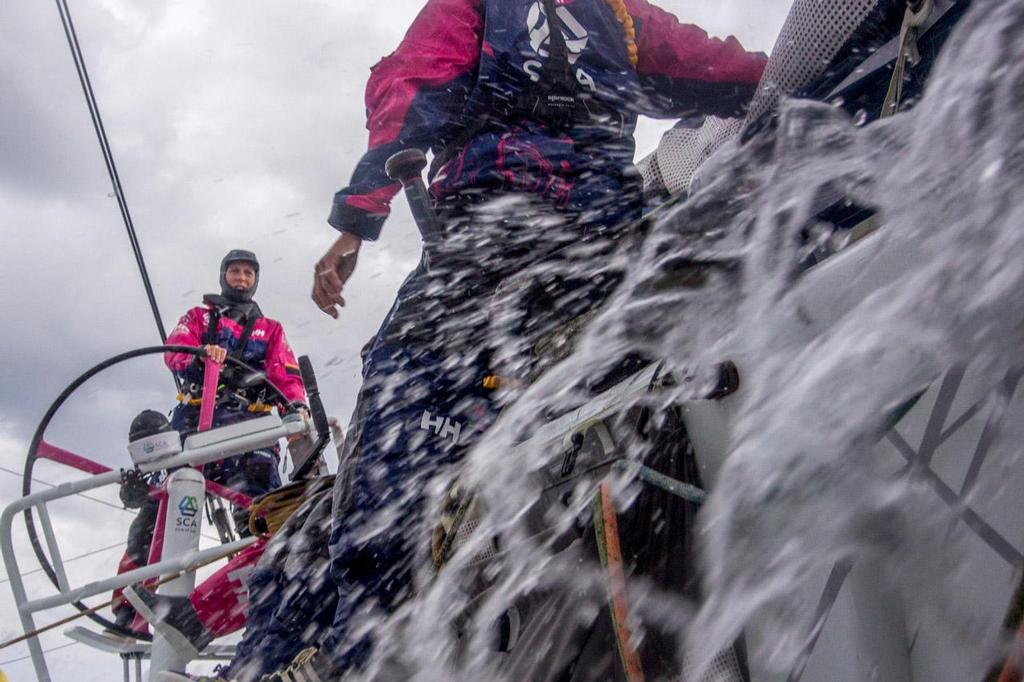 2014-15 Volvo Ocean Race - Leg 1 onboard Team SCA. Sam Davies gives instruction during her watch. © Corinna Halloran / Team SCA