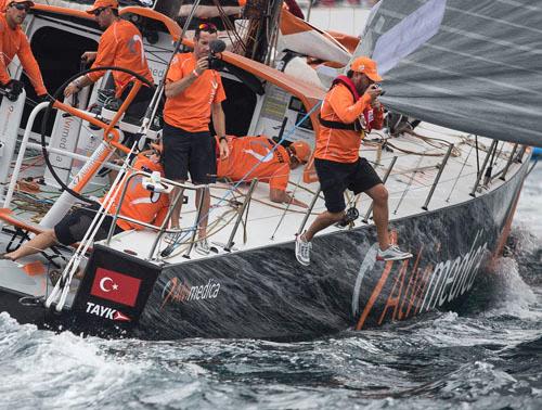 Team Alvimedica, Dr Cem Bozkurt,(CEO Alvimedica) jumps in the water. © Robin Christol