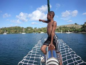 Orphanage boy enjoying Thunderbird 5's bowsprit netting photo copyright Ray Thackeray taken at  and featuring the  class