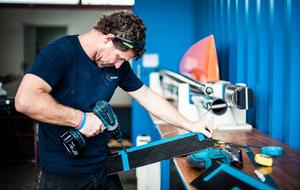 Neil Cox, Shore team manager at work in the team container - Team Vestas Wind, Volvo Ocean Race photo copyright Brian Carlin - Team Vestas Wind taken at  and featuring the  class