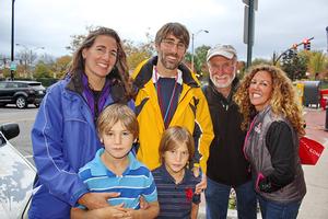Matt Warren (yellow jacket) will meet his family in Bermuda after they fly there and is getting assistance aboard Tashtego from professional captain David Lyman and crew member Christine Perakis (on right). photo copyright OPO http://www.sailopo.com/ taken at  and featuring the  class