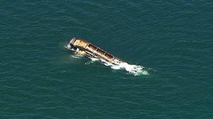 Aerial shot of the barge being scuttled. photo copyright 7News Brisbane taken at  and featuring the  class
