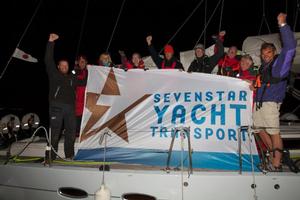 Peter Hopps and crew on Hanse 531, Saga celebrate winning IRC One in the Sevenstar Round Britain and Ireland Race  - Sevenstar Round Britain and Ireland Race 2014 photo copyright Patrick Eden/RORC taken at  and featuring the  class