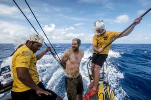 October, 2014. Leg 1 onboard Abu Dhabi Ocean Racing. Matt Knighton crossed the Equator for the first time, and pays tribute to King Neptune, as all ``Pollywogs`` should do when crossing the imaginary line for the first time. The rest of the crew who has passed the Equator before are called ``Shellbacks``. photo copyright Abu Dhabi Ocean Racing taken at  and featuring the  class