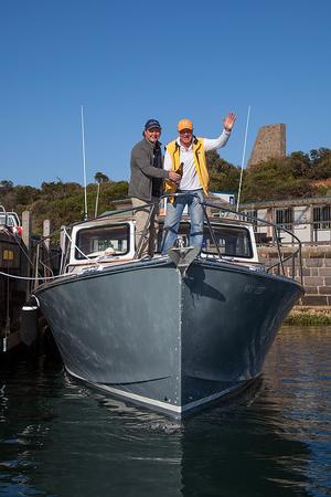 Proud builder and thrilled owner let the Champagne fly… photo copyright  Alex McKinnon Photography http://www.alexmckinnonphotography.com taken at  and featuring the  class