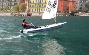 Brad Gibson foiling a Laser on Lake Garda, Italy photo copyright Glide Free taken at  and featuring the  class