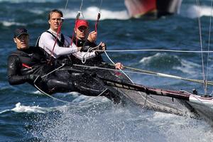 Concentration shows on the faces of the De'Longhi crew. - 18ft Skiffs Major A. Frizelle Trophy 2014 photo copyright Australian 18 Footers League http://www.18footers.com.au taken at  and featuring the  class