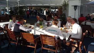 Crew of Swish at breakfast at RQYS photo copyright Lisa Ratcliff taken at  and featuring the  class