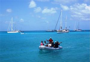 Crews coming ashore for clearances - 2014 World ARC, Cocos Keeling photo copyright World Cruising Club http://www.worldcruising.com taken at  and featuring the  class