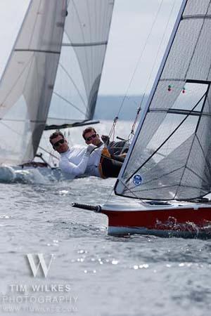 Rob Paterson [L] and Gordo Cook [R] speeding their International 14 Red Headed Step Child across Mahone Bay on day one of Chester Race Week 2014. While Race Week is Canada’s largest annual keel boat regatta, the “i14s” - all from Ontario - are not keel boats but are a thrilling 2014 demonstration class. photo copyright Tim Wilkes http://www.TimWilkes.com taken at  and featuring the  class