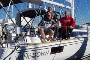 Debbie & Dale on Winedown with their crew - 2014 Caribbean 1500 photo copyright World Cruising Club http://www.worldcruising.com taken at  and featuring the  class