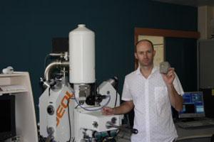 Dr Carl Spandler with a rock containing zircon from Vanuatu photo copyright James Cook University http://cms.jcu.edu.au/ taken at  and featuring the  class