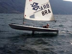 Francesco foiling a Laser for the first time with Glide Free Foils photo copyright Glide Free taken at  and featuring the  class