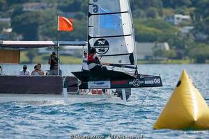 Bora Gulari, a former Moth World Champion, crosses the finish line in Hawaii, 2013. - 2015 Moth World Championship photo copyright Thierry Martinez http://www.thmartinez.com taken at  and featuring the  class