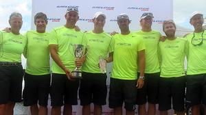Delta - from left to right: Linda Lindquist-Bishop, Jonathan McKee, Doug DeVos, Dalton DeVos, Zach Hurst, John Wallace, Cody Schlub and Morgan Reeser - 2014 Melges 32 U.S. National Champions photo copyright 2014 JOY | IM32CA taken at  and featuring the  class