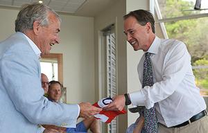 The Hon Greg Hunt MP, Member for Flinders presents SSCBC Commodore, Andrew Plympton, with the Australian flag. photo copyright Matt Mackay taken at  and featuring the  class