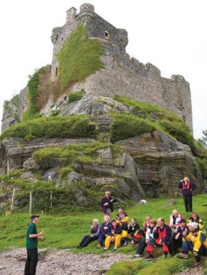 Whiskey nosing at Castle Tioram - Galley Guys on the Malty Seas photo copyright Christine Spreiter taken at  and featuring the  class