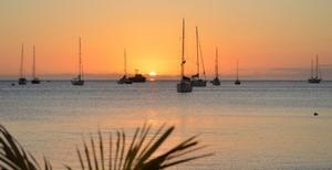 Sunset -all is calm but what about a dinghy trip back to your boat at night, if there is a strong offshore breeze? photo copyright SW taken at  and featuring the  class