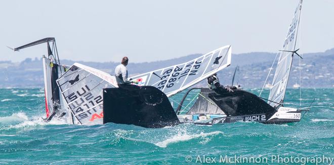 SUI4112 Chris Rast capsized, JPN3989 Hiroki Goto goes down the mine, and AUS3900 Rohan Veal avoiding the carnage... - 2015 Moth World Championships ©  Alex McKinnon Photography http://www.alexmckinnonphotography.com