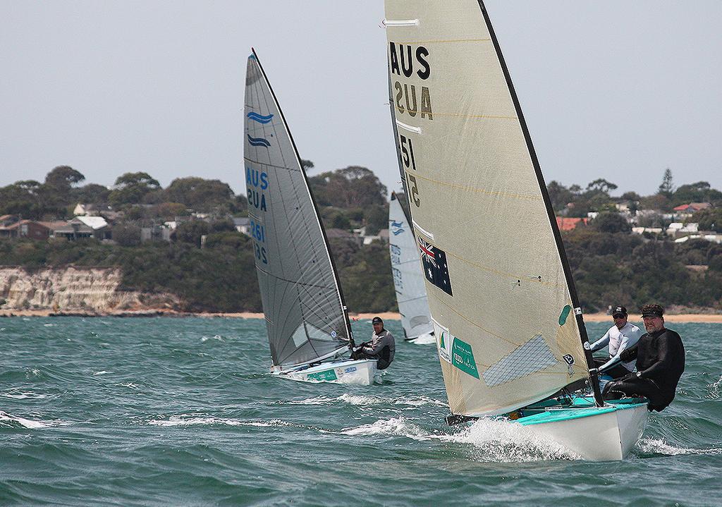 Rod Tanks (AUS51) brings a group out off the beach to sea. - 2015 Finn Australian Championship © Lara Blasse