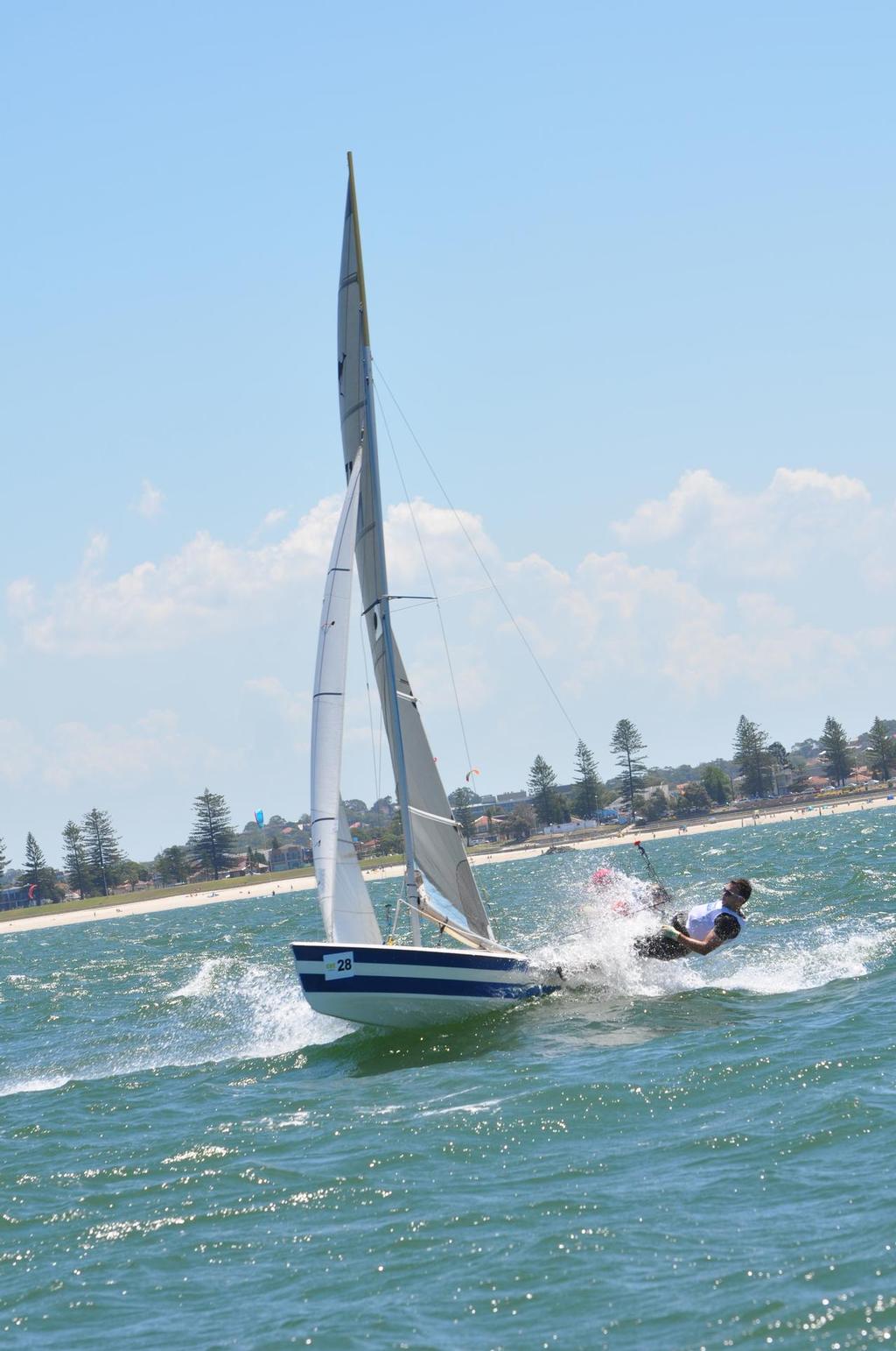 2nd Junior and 1st Female skipper Kelsy Hanrahan, punching through the botany bay chop © Lou Hollis