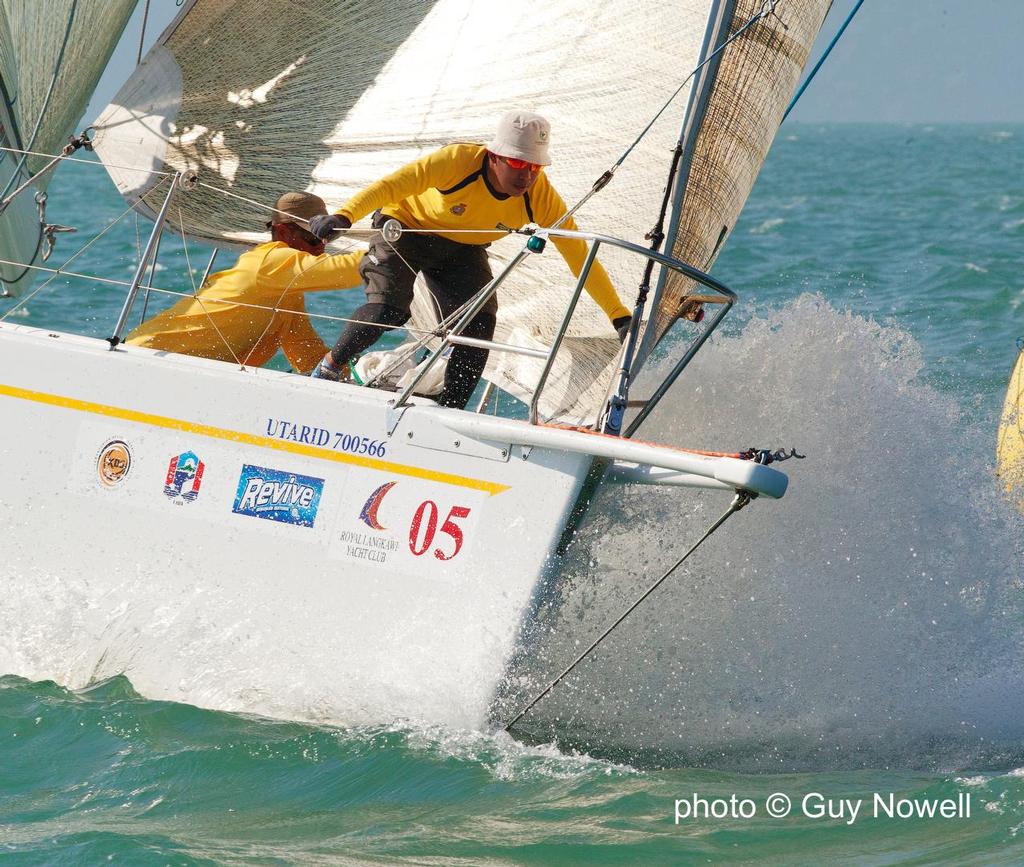 Team work on the foredeck. Utarid. Royal Langkawi International Regatta 2015 © Guy Nowell http://www.guynowell.com