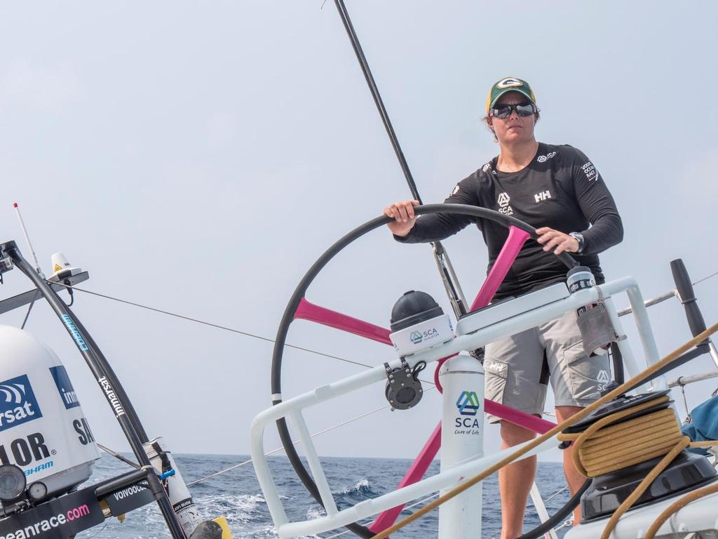 Leg 3 onboard Team SCA. Game Day! Sally Barkow, a Wisconsin native, shows her support for her favorite NFL team: Greenbay Packers. © Corinna Halloran / Team SCA