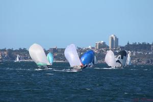 Close company on a spinnaker run  - 55th 12 Foot Skiff Interdominion Championship 2015 Hosted by NSW 12Ft Sailing Skiff Association at Australian 18 Footers League, Double Bay. photo copyright Vita Williams taken at  and featuring the  class