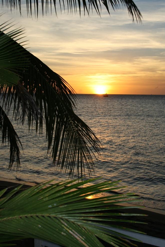 Anywhere on the western side of island, the sun sets and makes for a million-dollar memory. After time spent on the boat, we decided a few nights on the beach at the rustic Picard Beach Cottages might be nice. After several evening attempts to capture the green flash at sunset, I gave up! - Dominica By Elizabeth A. Kerr © Elizabeth A Kerr