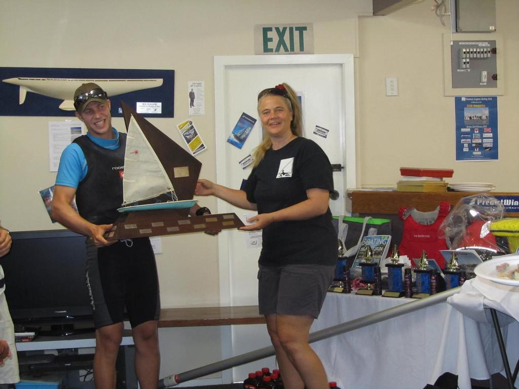 Daniel Barry from Sarnia Yacht Club, Canada being presented the RSA Trophy by Chantal Grass - PLSC RSA Laser Regatta © Bernard Eiseuring