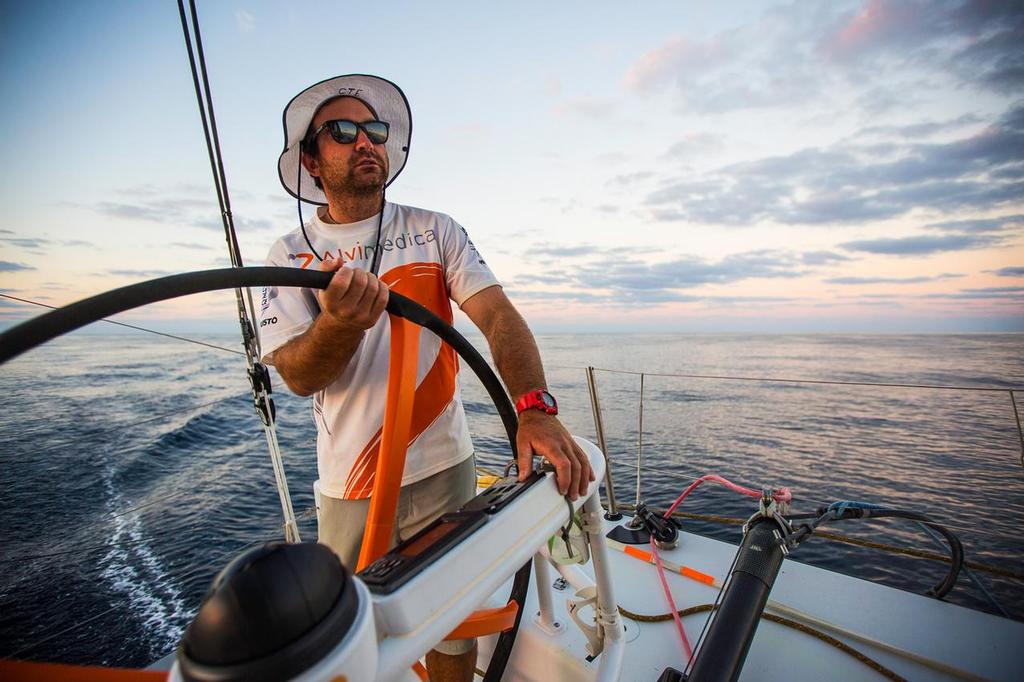 January 10, 2015. Leg 3 onboard Team Alvimedica. Day 7. More of the same--light winds and calm seas--on the way south in the Arabian Sea. Charlie Enright drives in light and difficult conditions. ©  Amory Ross / Team Alvimedica