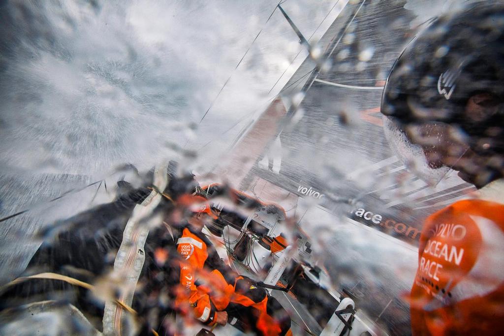February 10, 2015. Leg 4 to Auckland onboard Team Alvimedica. Day 2. The wet and unpleasant view from Mark Towill's perspective at the helm as Alvimedica hammers upwind. Alberto Bolzan sits below the stack trying in vain to stay out of the torrent. ©  Amory Ross / Team Alvimedica