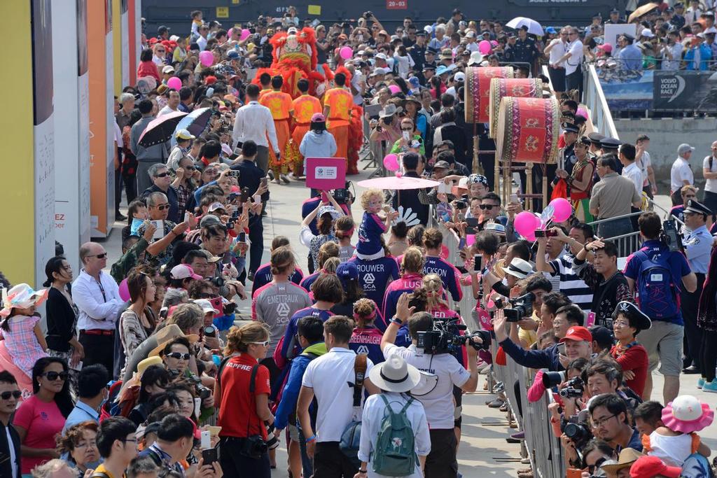 8 February 2015 Team SCA Volvo Ocean Race. Sanya China. Leg 4 Sanya to Auckland New Zealand.  Sailors parade to the boats. ©  Rick Tomlinson http://www.rick-tomlinson.com