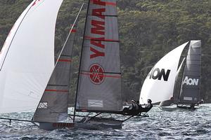 NZ pair Yamaha and AON lead the fleet down the first spinnaker run photo copyright Frank Quealey taken at  and featuring the  class