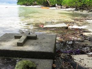 Tuwo has lost 300m of land and the graveyard is now underwater - OceansWatch Climate Change adaptation program - Solomon Islands photo copyright OceansWatch www.oceanswatch.org taken at  and featuring the  class