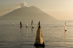 Fleet with Stromboli in eruption in the background 
 photo copyright  Rolex / Carlo Borlenghi http://www.carloborlenghi.net taken at  and featuring the  class