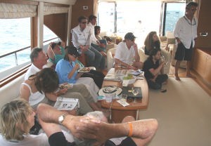 The main saloon aboard Tethys - Louis Vuitton Yacht for the Cups photo copyright Dick Enersen http://dickenersen.smugmug.com taken at  and featuring the  class
