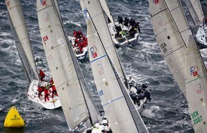 Fleet tightly packed around the windward mark, Race 7  - Rolex Farr 40 Worlds photo copyright  Rolex / Carlo Borlenghi http://www.carloborlenghi.net taken at  and featuring the  class