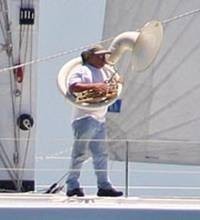 Mike Webster blows his horn as The Minnow starts its first race - Transpac 2007 © Rich Roberts http://www.UnderTheSunPhotos.com