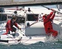 Tabasco crew hangs on before the wild start Thursday. Transpac 2007 © Rich Roberts http://www.UnderTheSunPhotos.com