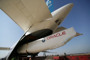 Disgorging the beast - BMW Oracle Racing’s new boat reappears from the throat of the Antonov after landing in Spain. photo copyright BMW Oracle Racing Photo Gilles Martin-Raget http://www.bmworacleracing.com taken at  and featuring the  class