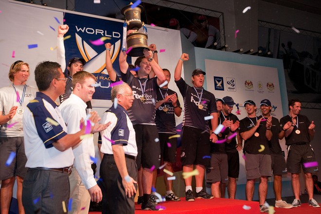 Adam Minoprio and the Black Match crew lift the World Match Race Tour trophy. Monsoon Cup 2009. Kuala Terengganu, Malaysia. 6 December 2009. Photo: Gareth Cooke/Subzero Images © Gareth Cooke Subzero Images/Monsoon Cup http://www.monsooncup.com.my