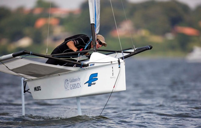 Simon Payne stays airborne during a gybe on Race 2 © Th.Martinez http://www.thmartinez.com