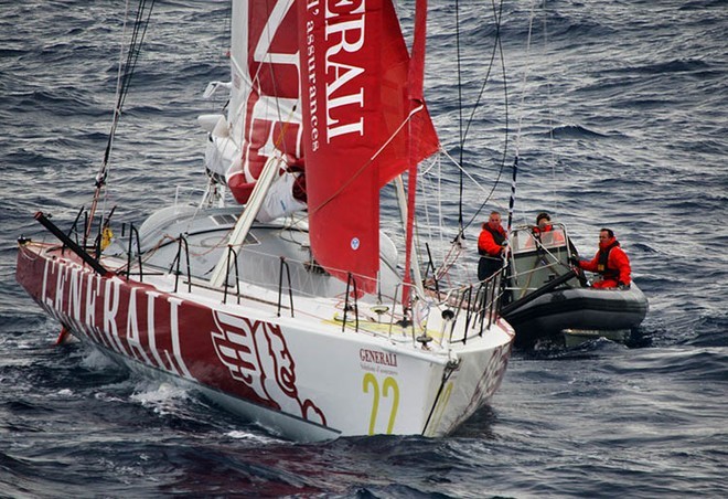 The boats crew on HMAS Arunta’s rigid hull inflatable boat stands by to assist medical personnel onboard the yacht ’Generali’ as they help the injured french yachtsman Yann Elies. Photography by Able Seaman Photographer Lincoln Commane.<br />
<br />
 © Commonwealth of Australia