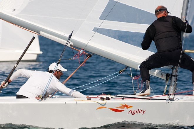 Monk and Pepper set up the mast for the downwind leg in the 2009 Star Worlds © Fried Elliott http://www.friedbits.com