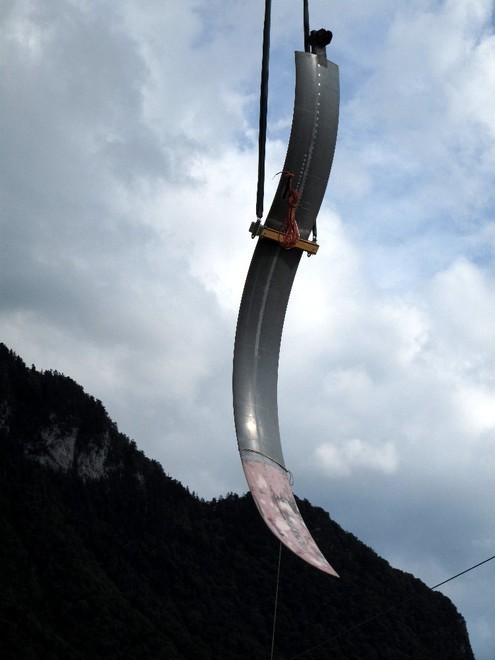 The unusually shaped leeboard is craned into position © Philippe Chaplin