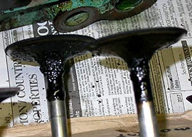 Just what one does not need to find when inspecting a marine engine - these valves now sport heavy deposits of varnish, courtesy of the solvent feature that exists in E10 fuel. © SW