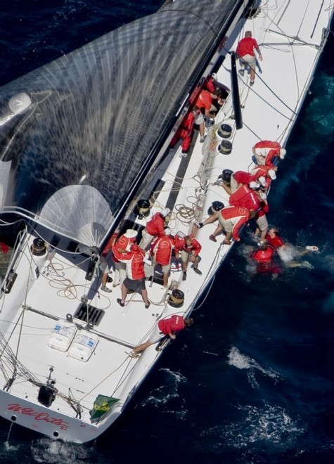 Recovery of overboard crews after Wild Oats XI is dismasted Porto Cervo, 2007 Maxi Yacht Rolex Cup  ©  Rolex / Carlo Borlenghi http://www.carloborlenghi.net
