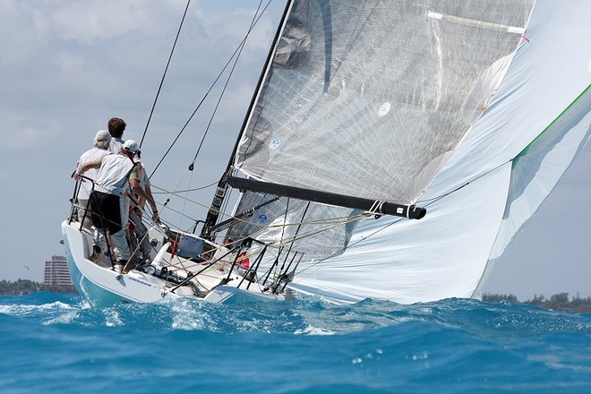 Peter Rogers on ’Highlife’ jibes for the downwind run to the finish. © JOY / IM32CA http://melges32.com/